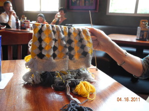Same trip, same socks, but at lunch. Annetarsia is the most portable knitting project you can imagine, even with 2 socks on the needle!